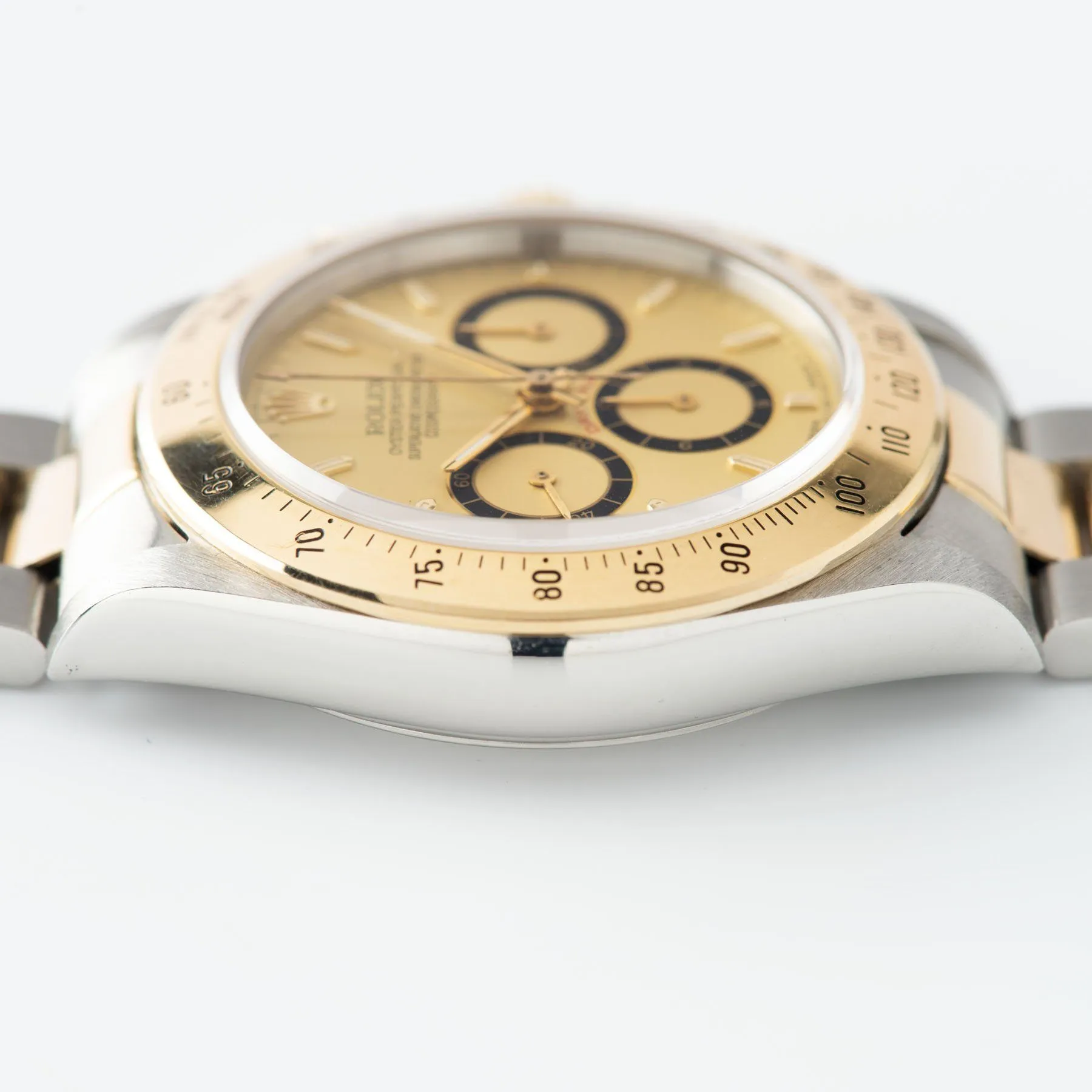 Rolex Daytona 16523 Champagne Four Line Dial with Papers
