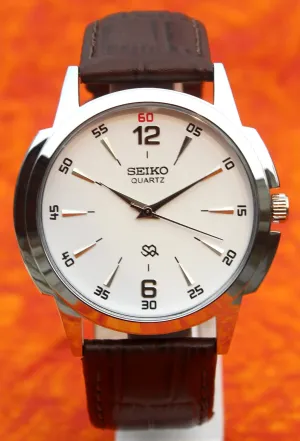 Seiko Quartz Japan Made Stainless Steel Case White Dial Faux Leather Strap Wristwatch